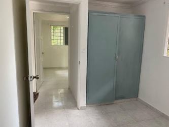 Bedroom with wardrobe tiled flooring natural light Panama house rent