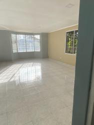 Spacious living room large windows ceramic tiles Altos de Vacamonte