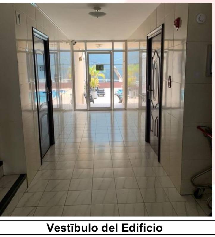 Exterior multistory Condo Las Terrazas with balconies parking and landscaped entrance in Villa de las Fuentes Panama