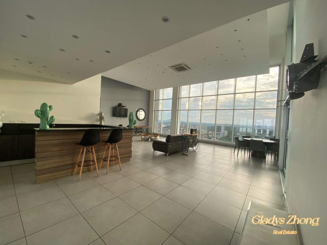 Modern open-concept living and dining area with city views in Sky Point Tower Panama