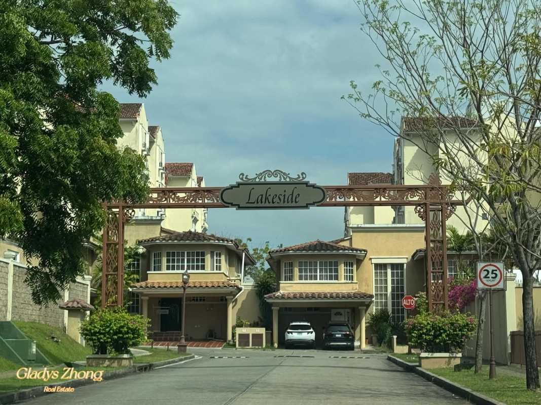 Gated main entrance Dorado Lakes residential community Condado del Rey Panama City