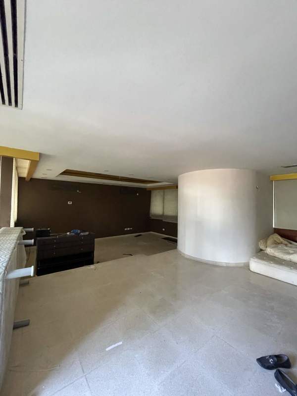 Spacious living room with large windows and curved design Punta Paitilla house