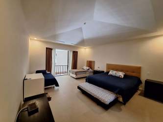 Private balcony with views of pool and golf course The Bristol Residences Buenaventura Panama