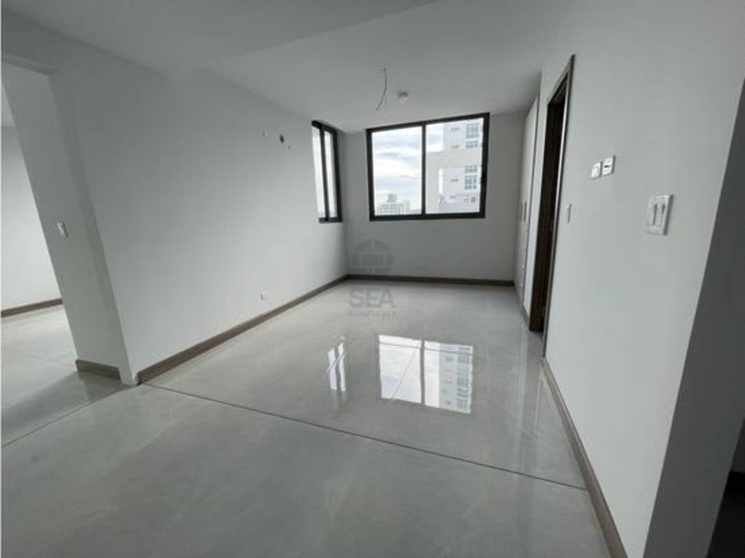 Spacious bedroom with closet and panoramic city view windows PH BICSA Tower