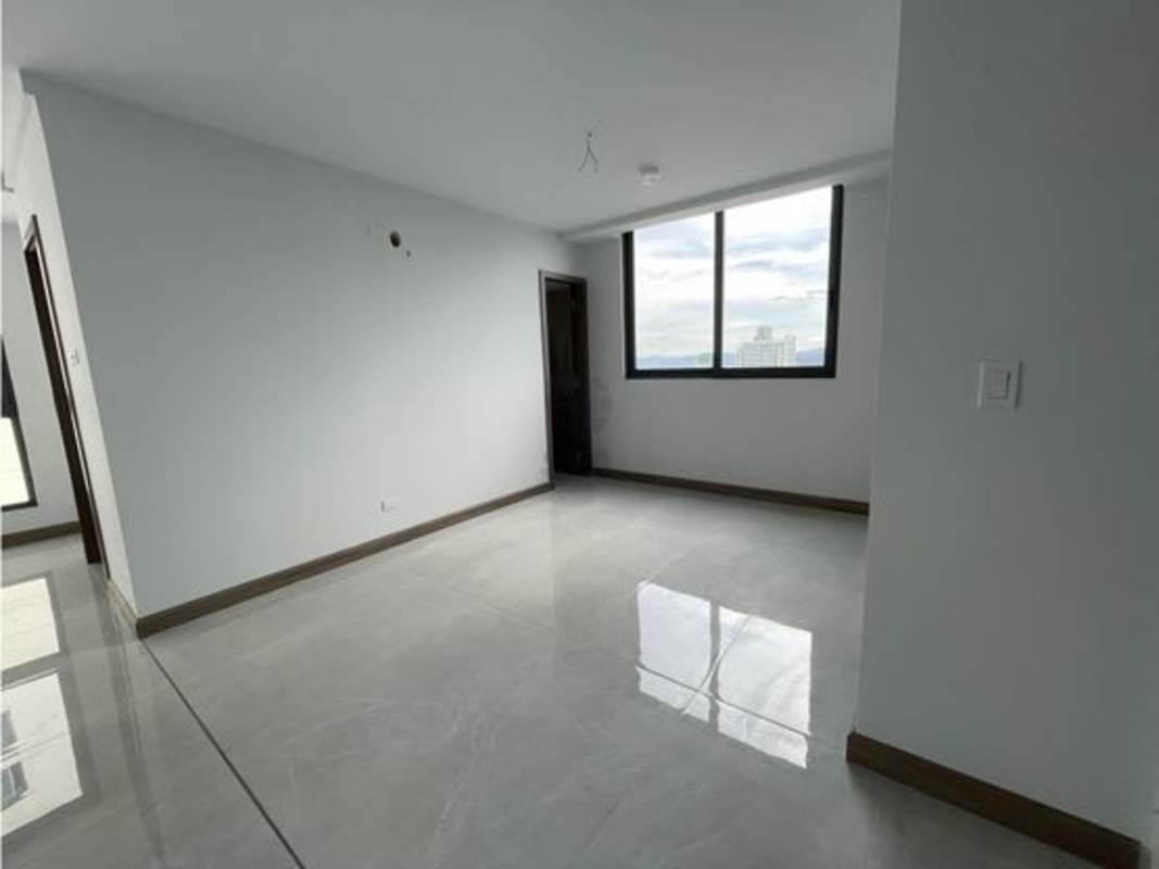 Bedroom with ceramic tile floor and skyline views at PH BICSA Tower Penthouse Panama