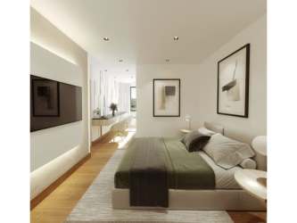 Bright bedroom with wooden floors, large window and modern decor in Explora Panama Pacifico