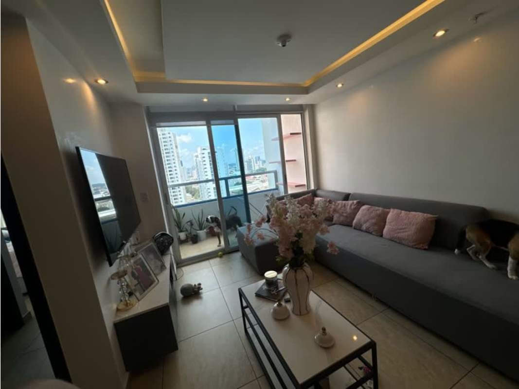 Spacious living room with large glass doors city view PH Vista Park Carrasquilla Panama