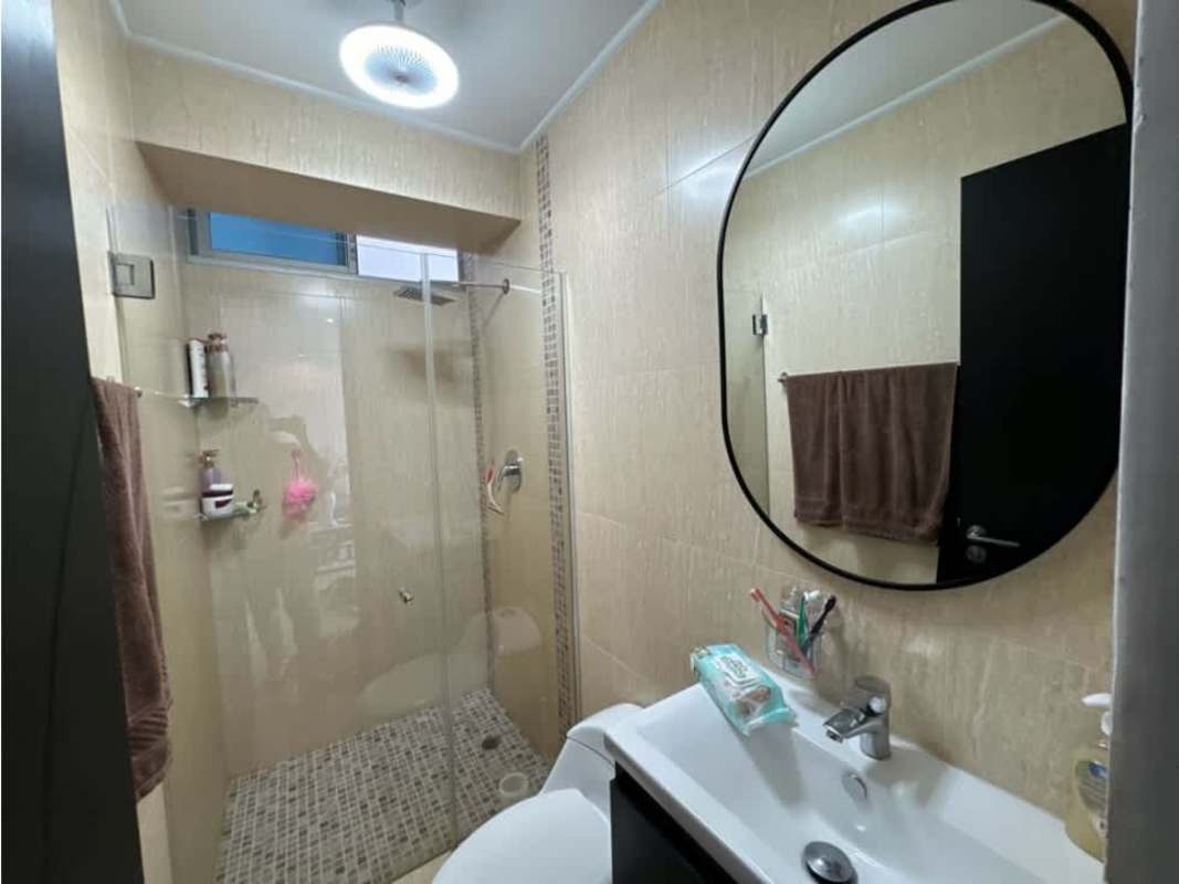 Bathroom with glass shower, sink, and mirror PH Vista Park Carrasquilla Panama