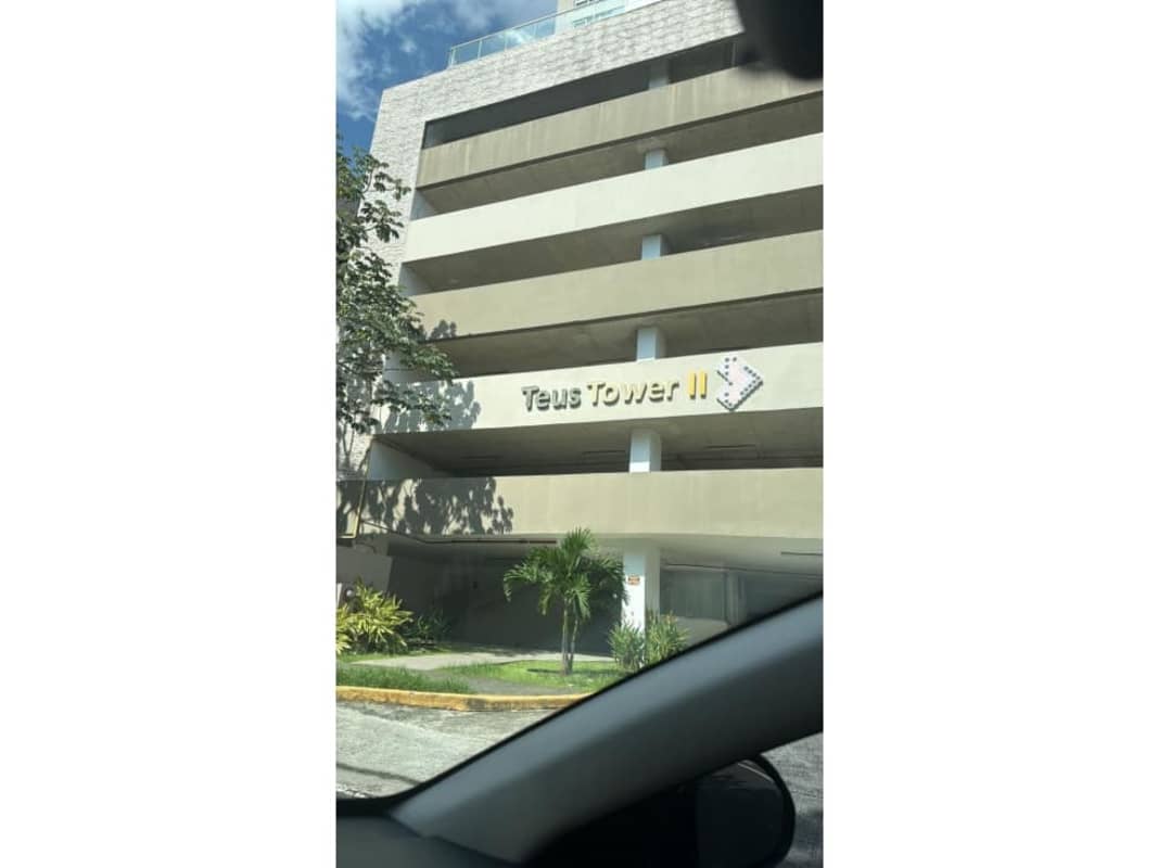 Open concept living and dining room with balcony access PH Teus Tower II Carrasquilla