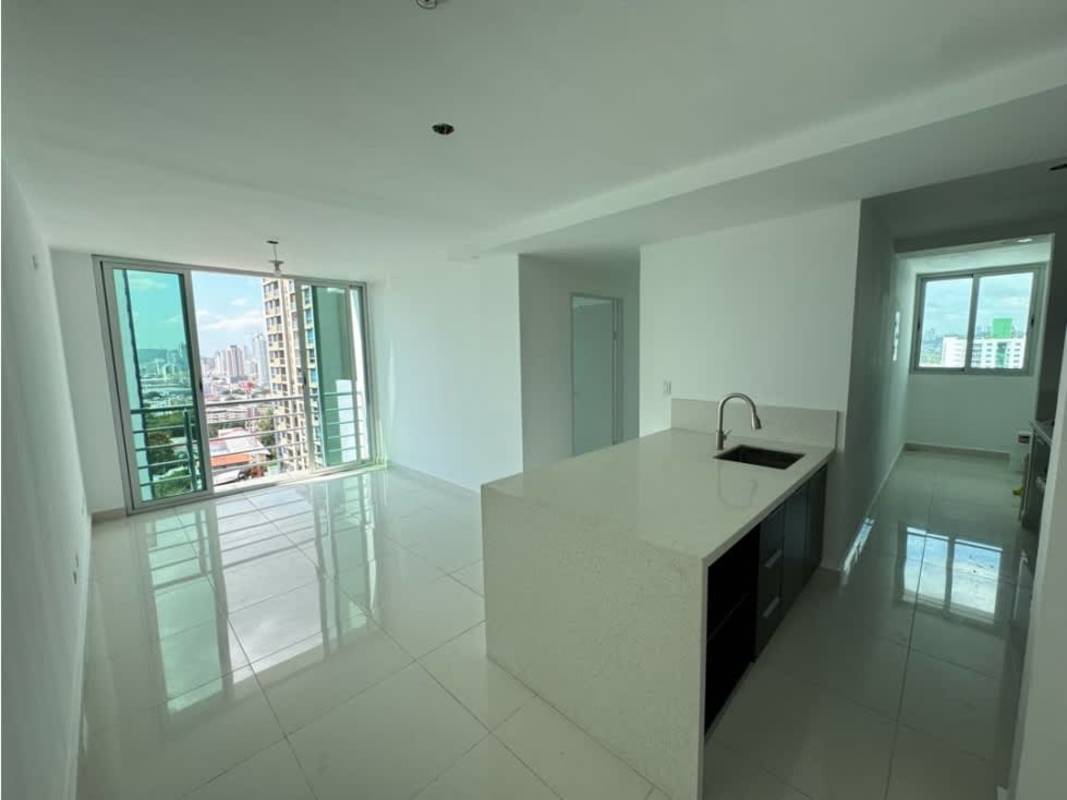 Kitchen island, large glass sliding doors to balcony PH Teus Tower II Panama