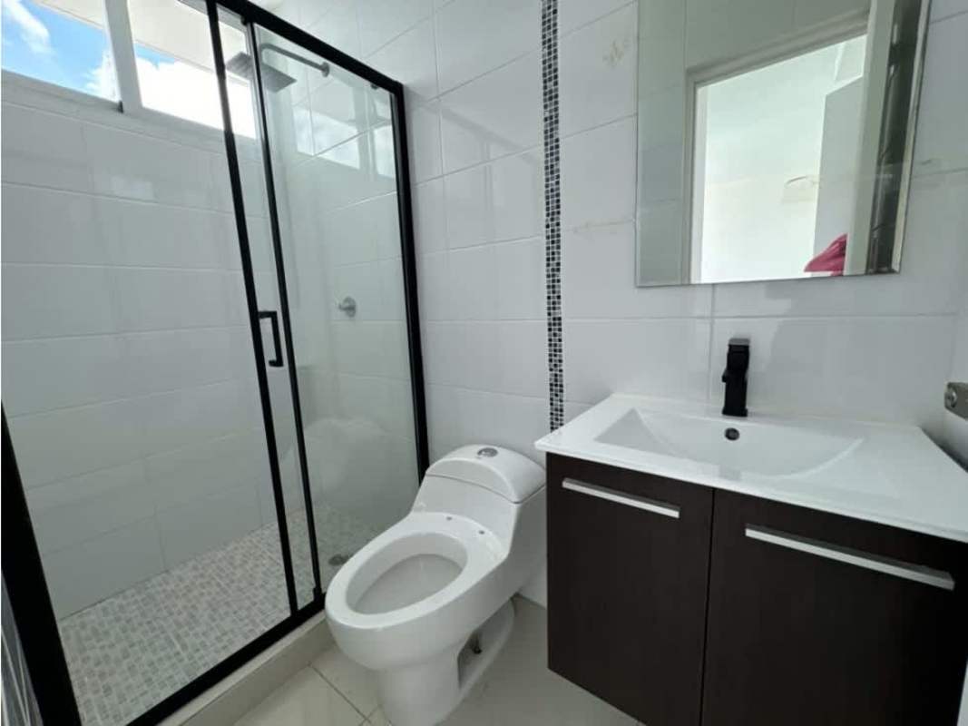 Bathroom with glass shower enclosure, mosaic tile accents PH Teus Tower II Panama City