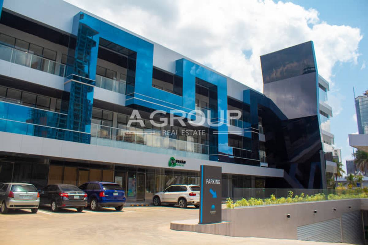 Modern shopping office complex with palm trees and parking Sunset Strip San Francisco Panama