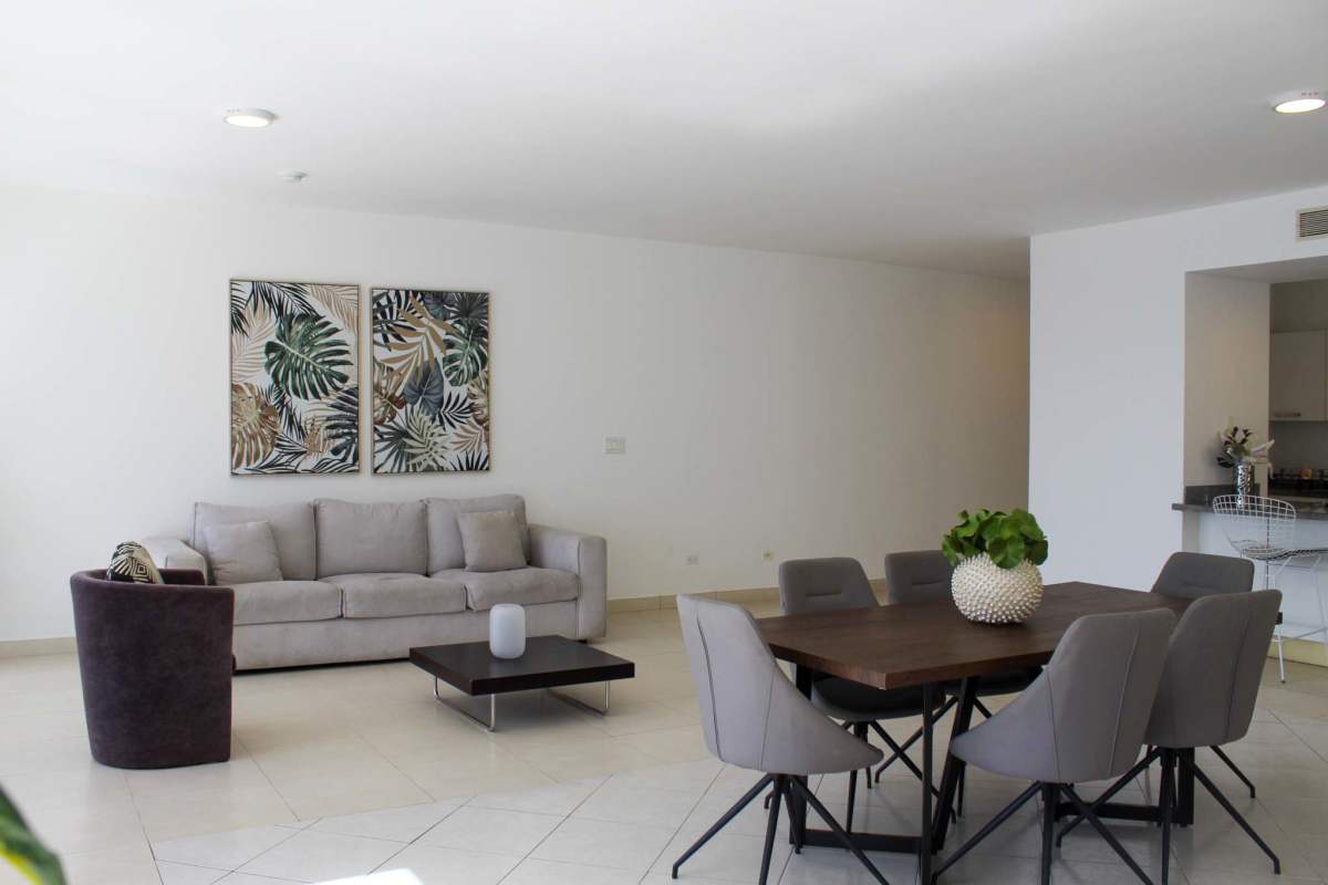 Contemporary kitchen with granite countertops and stainless appliances in PH Waters on the Bay Panama