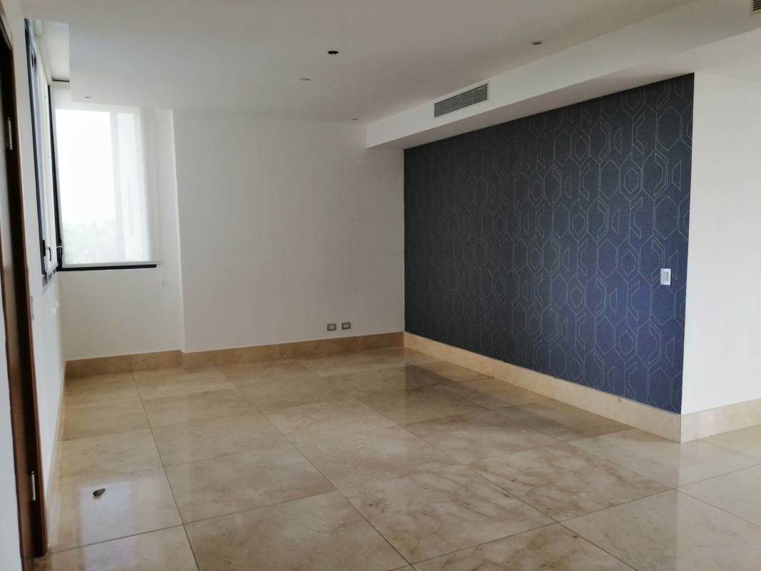 Bright marble-floored living area with floor-to-ceiling windows Valery Point Panama