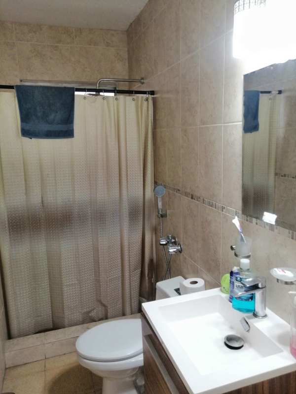 Spacious covered balcony with city skyline views in PH Altamar Bella Vista apartment in Panama City