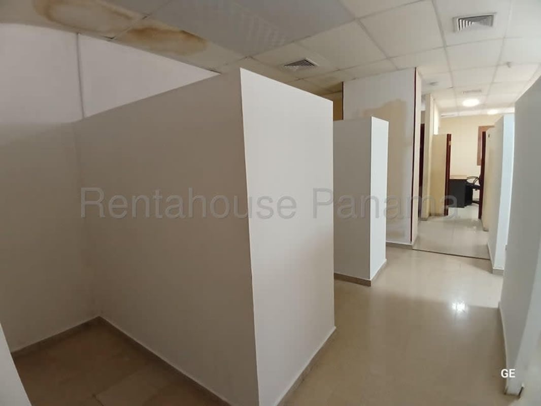 Private executive office with wood floor, built-in shelves at PH Kamelia Plaza ground floor commercial premises