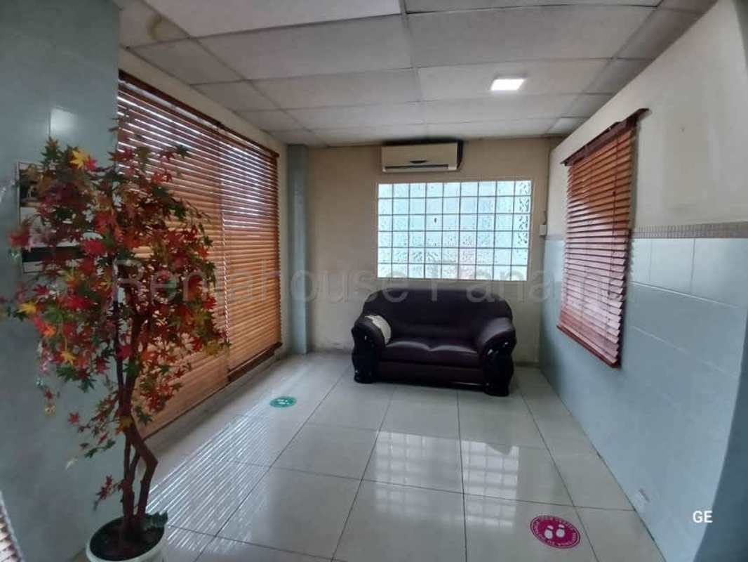 Private office with glass block window, neutral decor PH Kamelia Plaza Panama