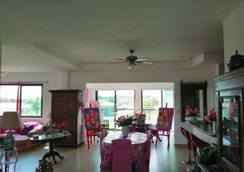 Open kitchen with granite counters breakfast bar in Hacienda Pacifica Panama