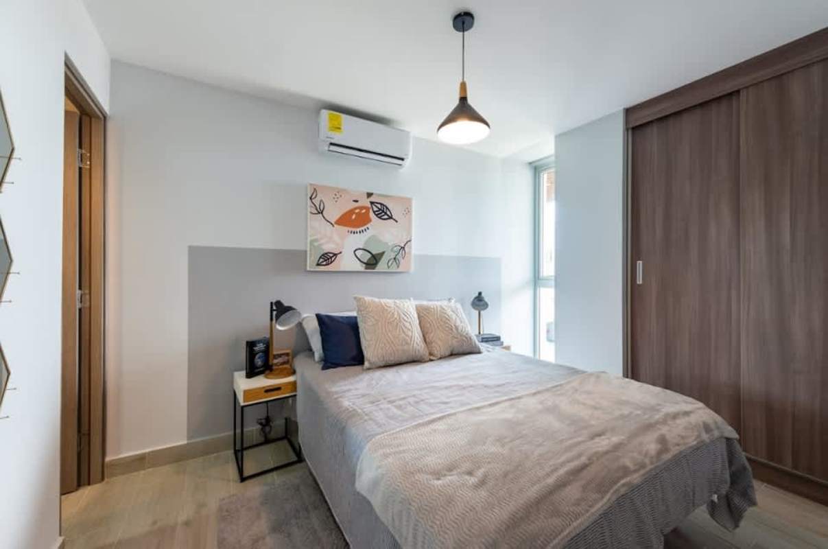 Fully equipped gym with machines and weights at PH GreenWood Panama