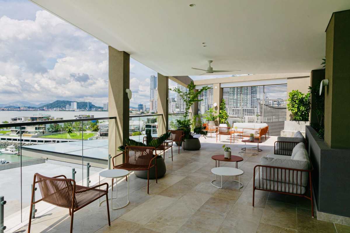 Rooftop pool with city skyline and ocean views at luxury condo Ocean Reef Panama