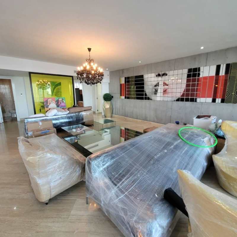 Spacious living area with marble floors, contemporary decor, and skyline views in Punta Paitilla Panama