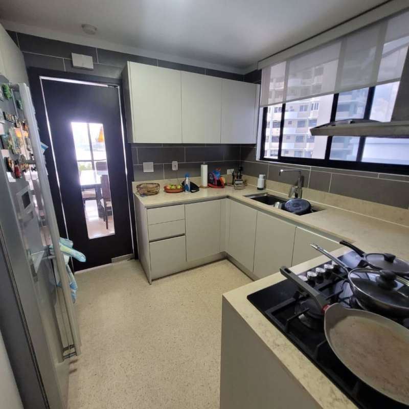 Open plan living dining room with ocean view windows in Punta Paitilla condo PH Mediterranee