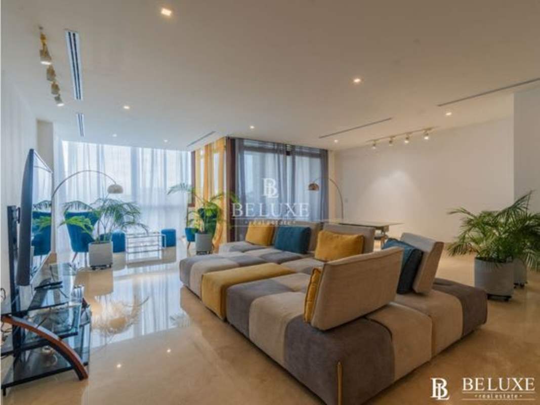 Spacious bedroom with panoramic windows overlooking marina, luxury finishes in Ocean Reef Islands apartment