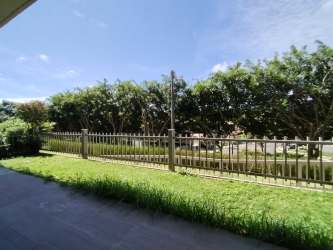 Green gardens with privacy fence at PH Madeira Panama Pacifico
