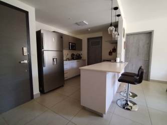 Living and dining area with sliding glass doors bright light PH Madeira Panama