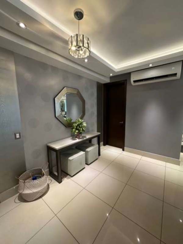 Entry foyer with designer lighting and accent wall PH Bali Costa del Este Panama