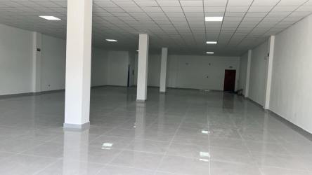 Bright open commercial unit with tiled floors, white walls, drop ceiling at Plaza La Preferida in Costa Verde Colón Panama