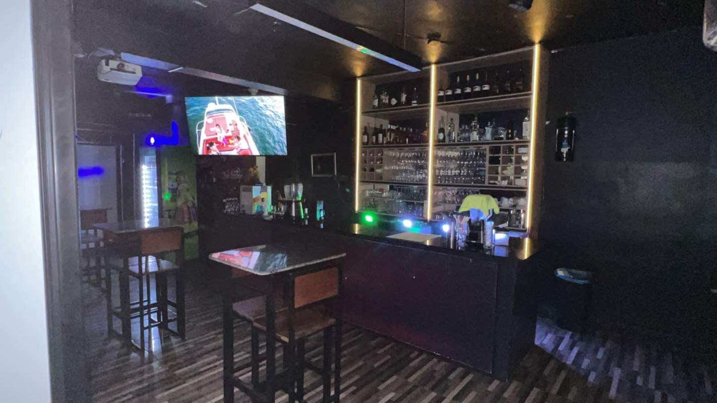 Illuminated back bar lounge urban restaurant commercial space Obarrio Panama