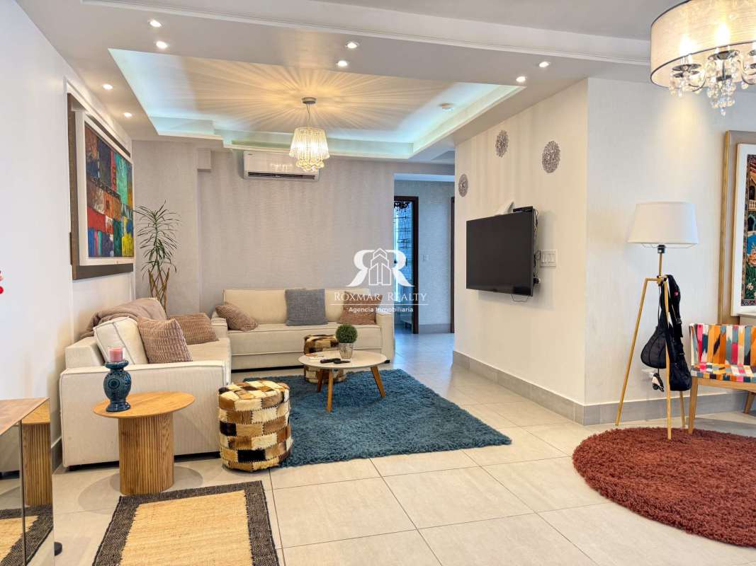 Closed kitchen with granite countertops, appliances, and white cabinets PH Jade Tower