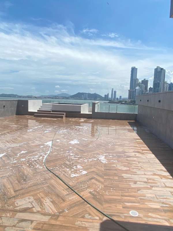 Designer kitchen with island and panoramic windows in penthouse Ocean Reef Islands Peninsula Tower Panama