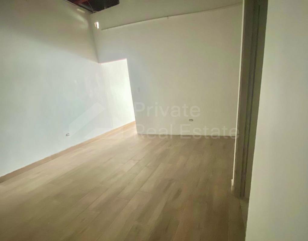 Storefronts and glass facades of Midtown Plaza commercial complex on Avenida Ricardo J. Alfaro Panama City