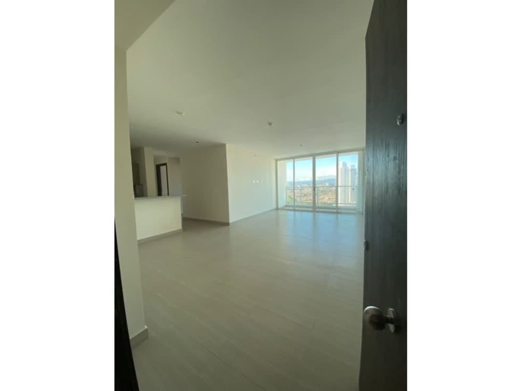 Open contemporary kitchen with granite counters and cabinetry in PH Asia Costa del Este Panama