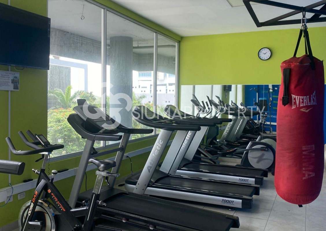 Modern outdoor bar area with patterned tile and greenery Sol del Este Panama