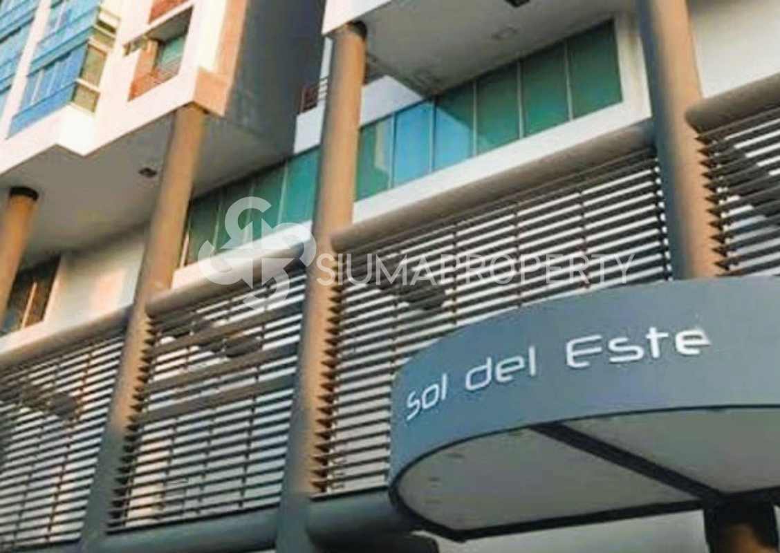 High-rise tower PH Sol del Este with modern glass facade in Costa del Este Panama