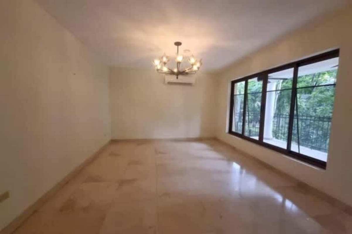 Modern living room marble floors large windows chandeliers Senderos de Camino de Cruces Clayton