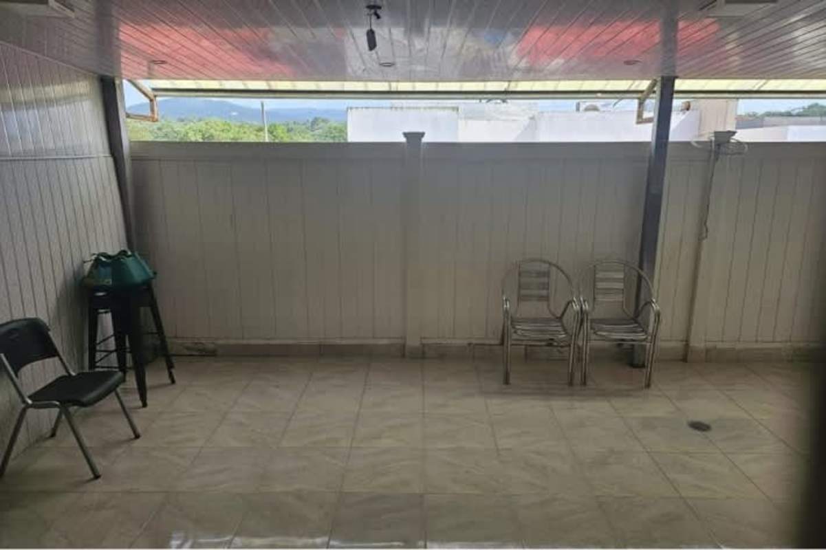 Functional kitchen with window, cabinets and countertop in rental house Brisas del Golf Panama