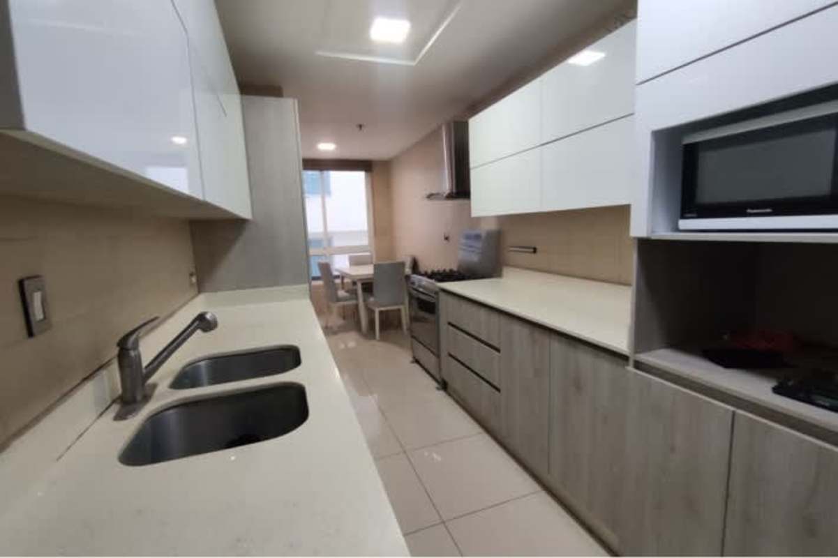 Laundry room with washer dryer in PH San Francisco Bay furnished apartment Panama