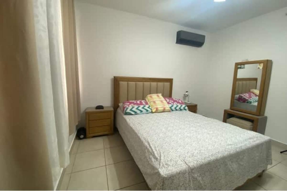 Contemporary bathroom with tiled shower and granite vanity in Brisas del Golf Panama