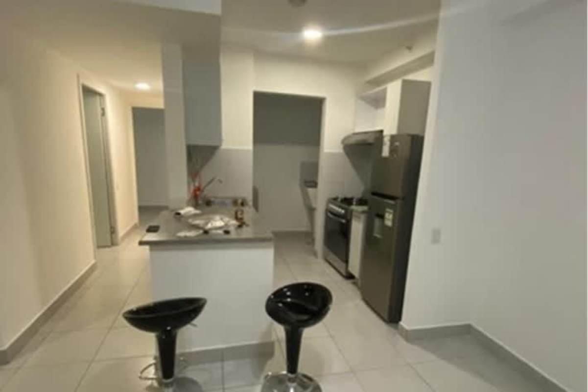 Open kitchen with breakfast bar modern appliances in PH Ilo Rio Abajo Panama