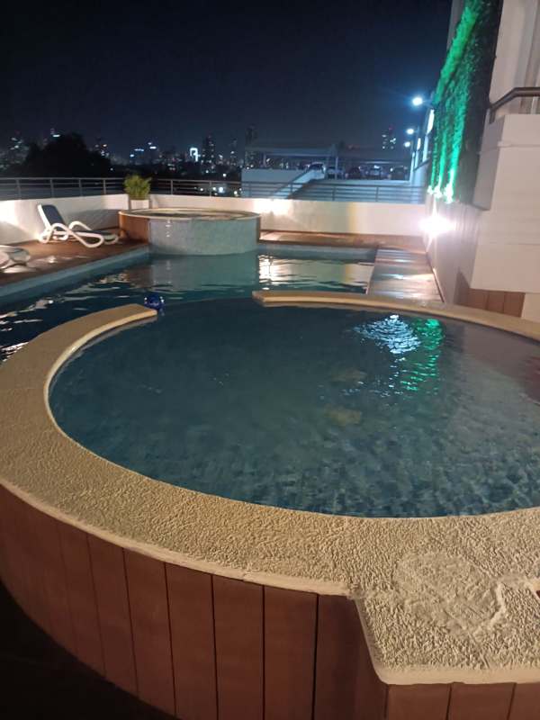 Night view rooftop pool and hot tub at PH Lefevre 75 Parque Lefevre Panama