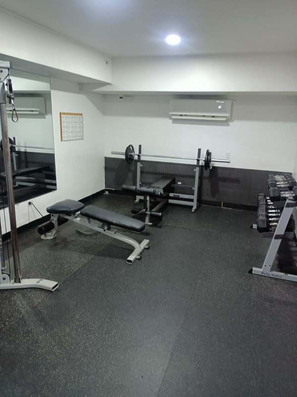 Night front view of Lefevre 75 mixed-use condominium commercial plaza Panama City