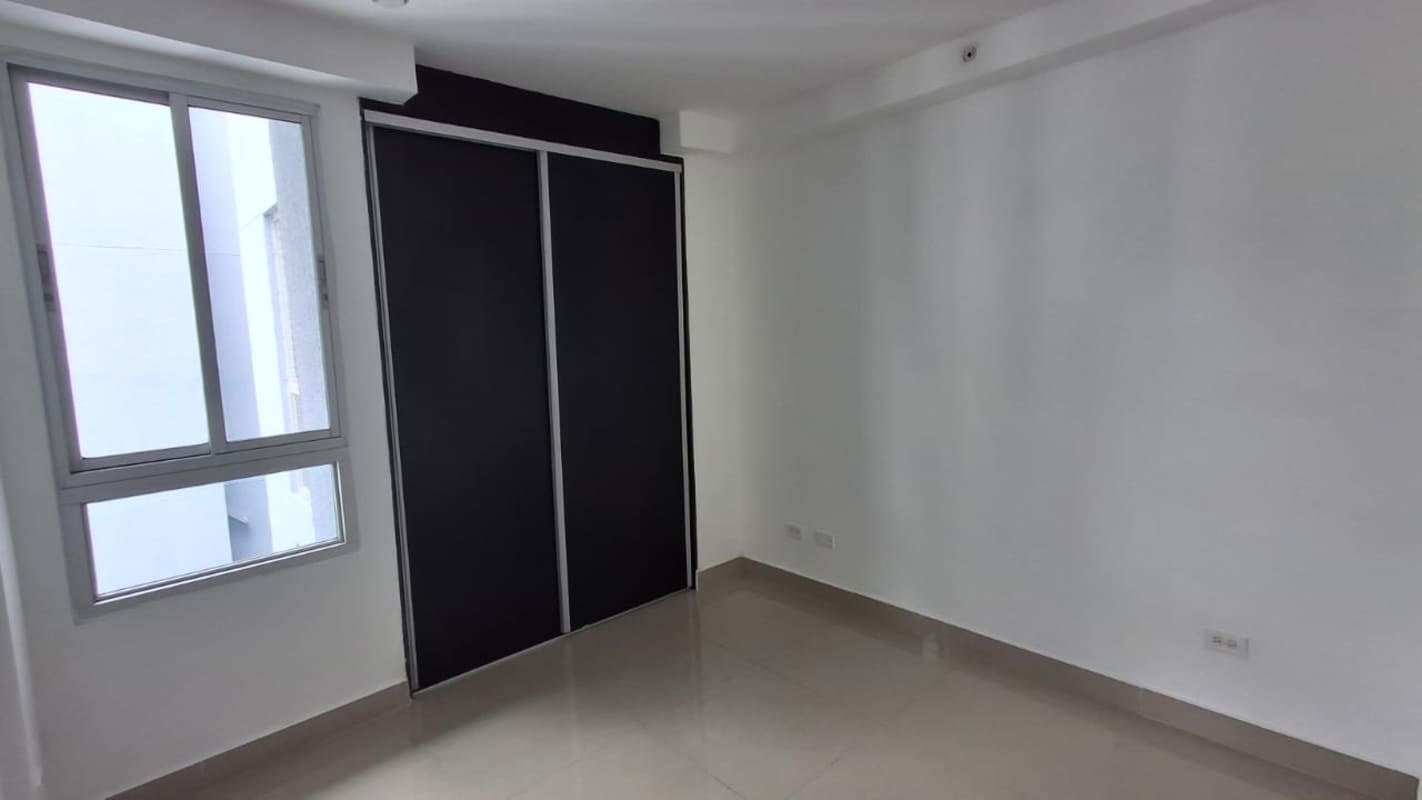 Open modern kitchen with granite countertops at PH Coral Tower Panama