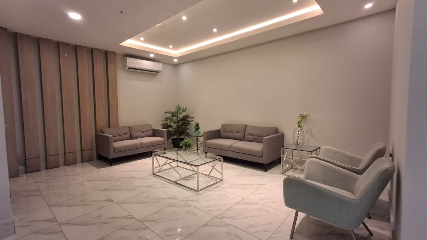 Bright living room with panoramic window at PH Coral Tower Carrasquilla Panama