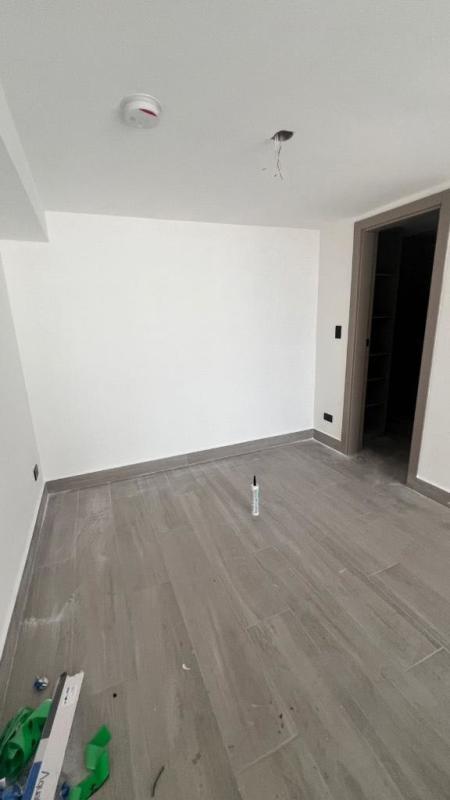 Unfurnished minimalistic loft with ceramic floor and panoramic windows in Coco del Mar Tower Panama