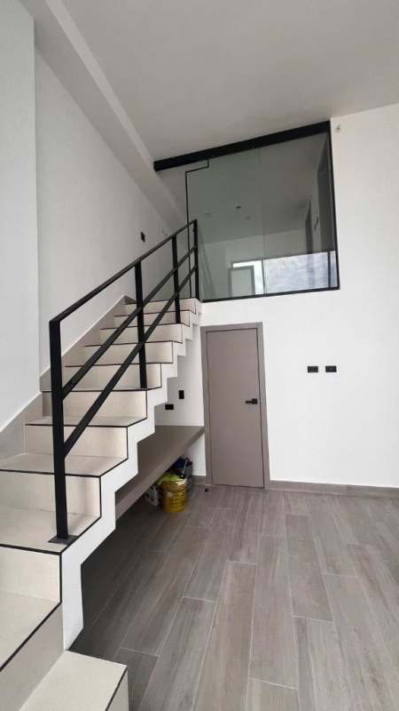 Walk-in closet and upstairs loft bedroom in modern ocean view apartment in PH Coco del Mar Tower Panama