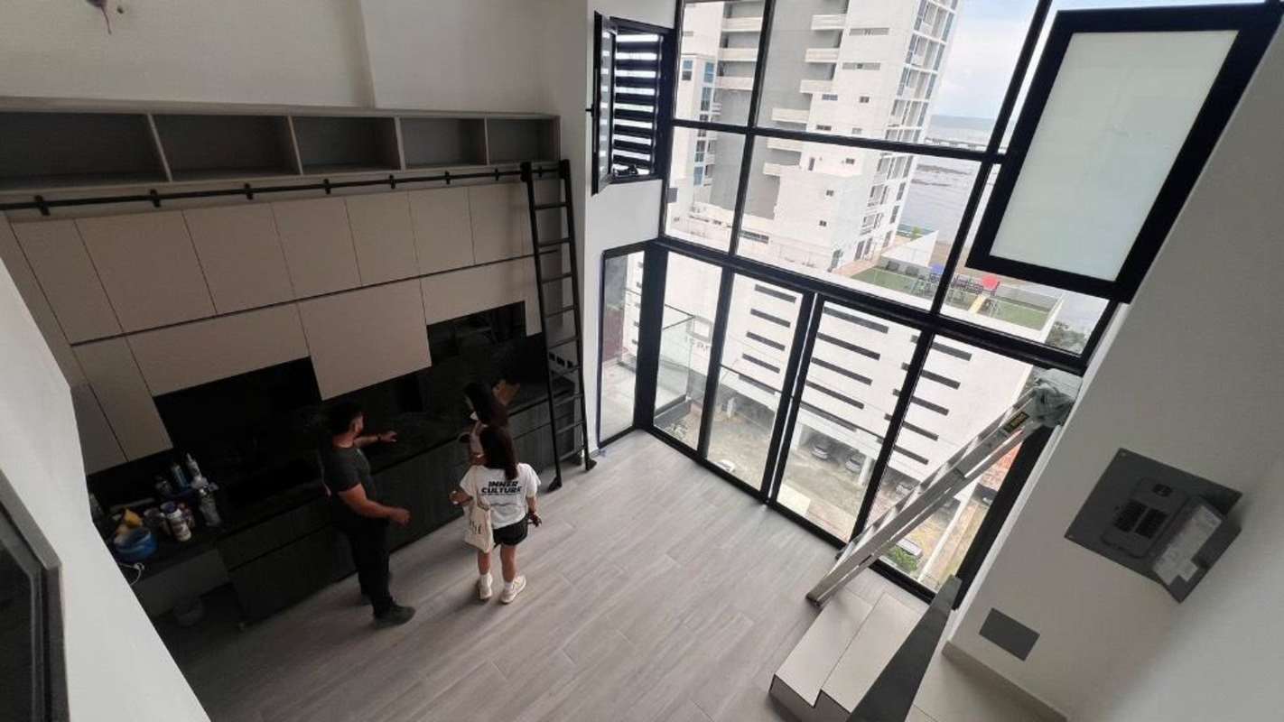 Stylish loft apartment with double-height ceiling and ocean-facing windows at Coco del Mar Tower Panama